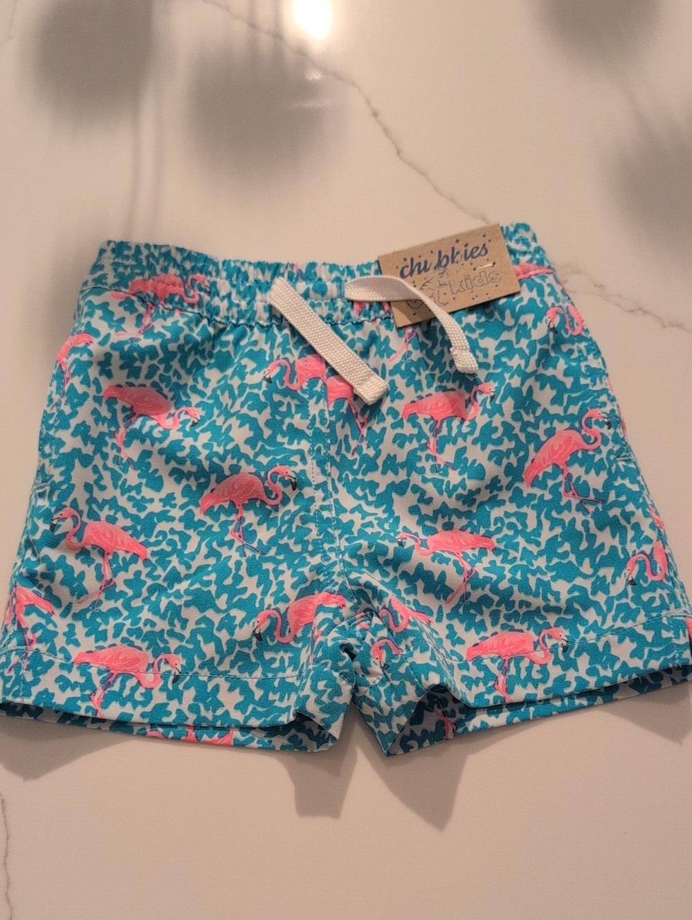 chubbies Kids Turquoise Swim Trunks with Pink Flamingos